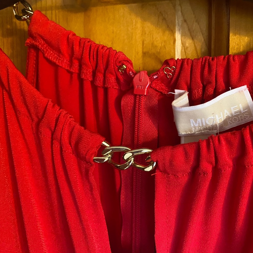A Michael Michael Kors blouse. Never worn. Size XM. Red